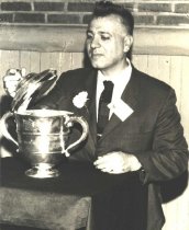Unkown Man and Trophy at Stabl